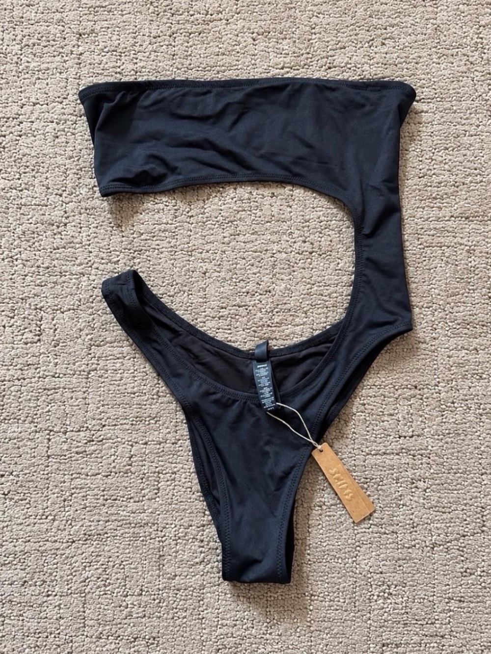 SKIMS Black Cut-Out Bandeau One-Piece
Swimsuit - Size M